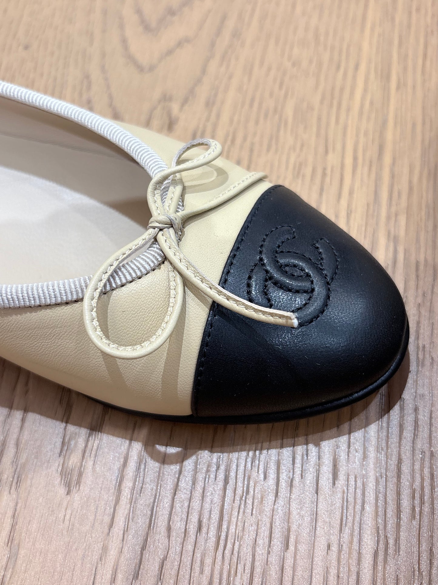 Chanel cap-toe ballet flats