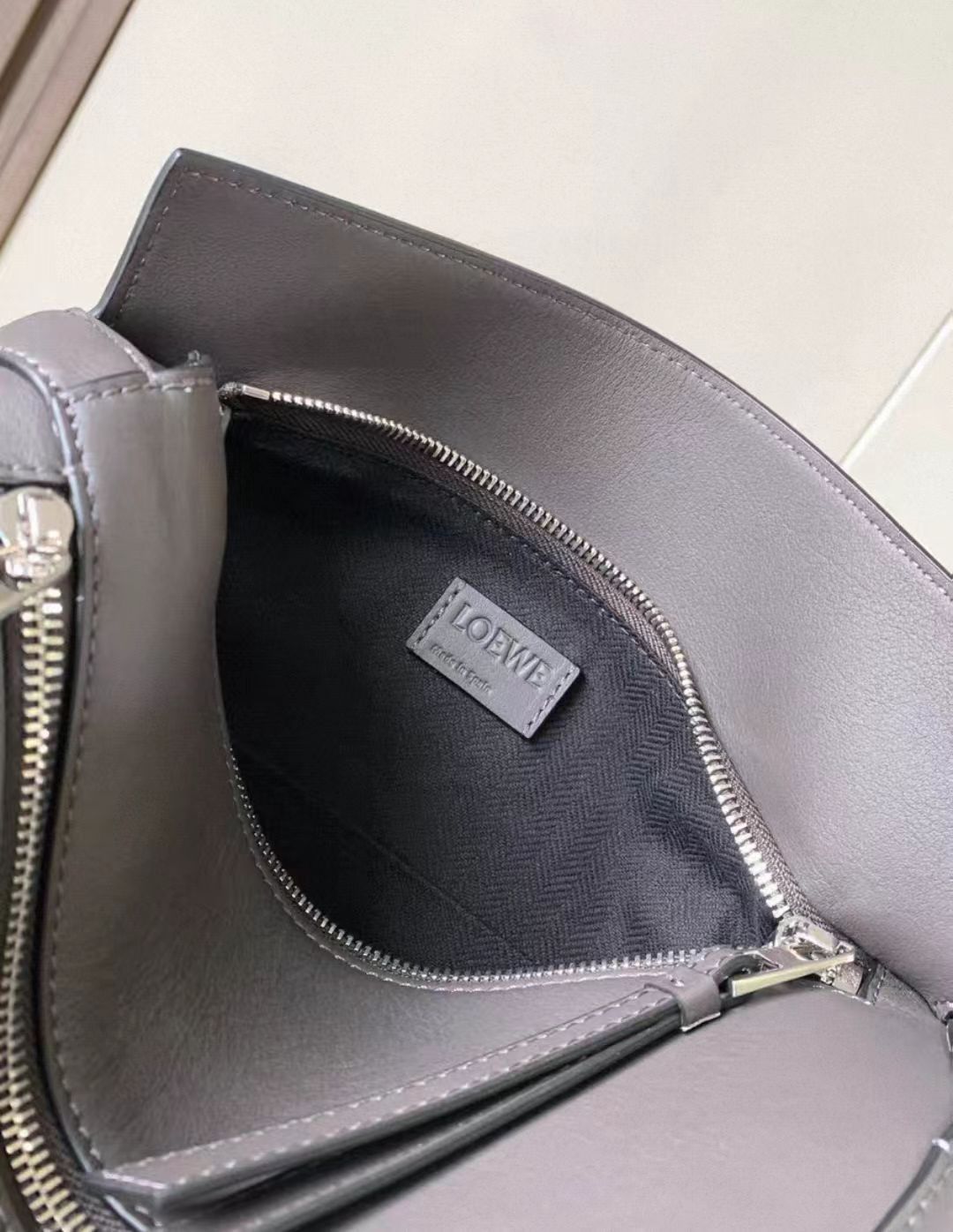 LOEWE
Puzzle leather belt bag