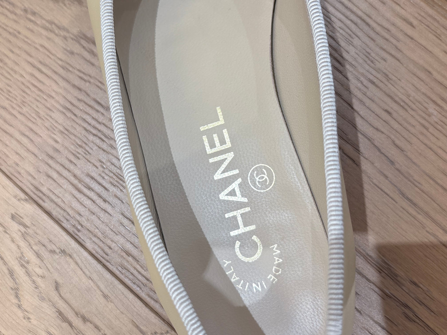 Chanel cap-toe ballet flats