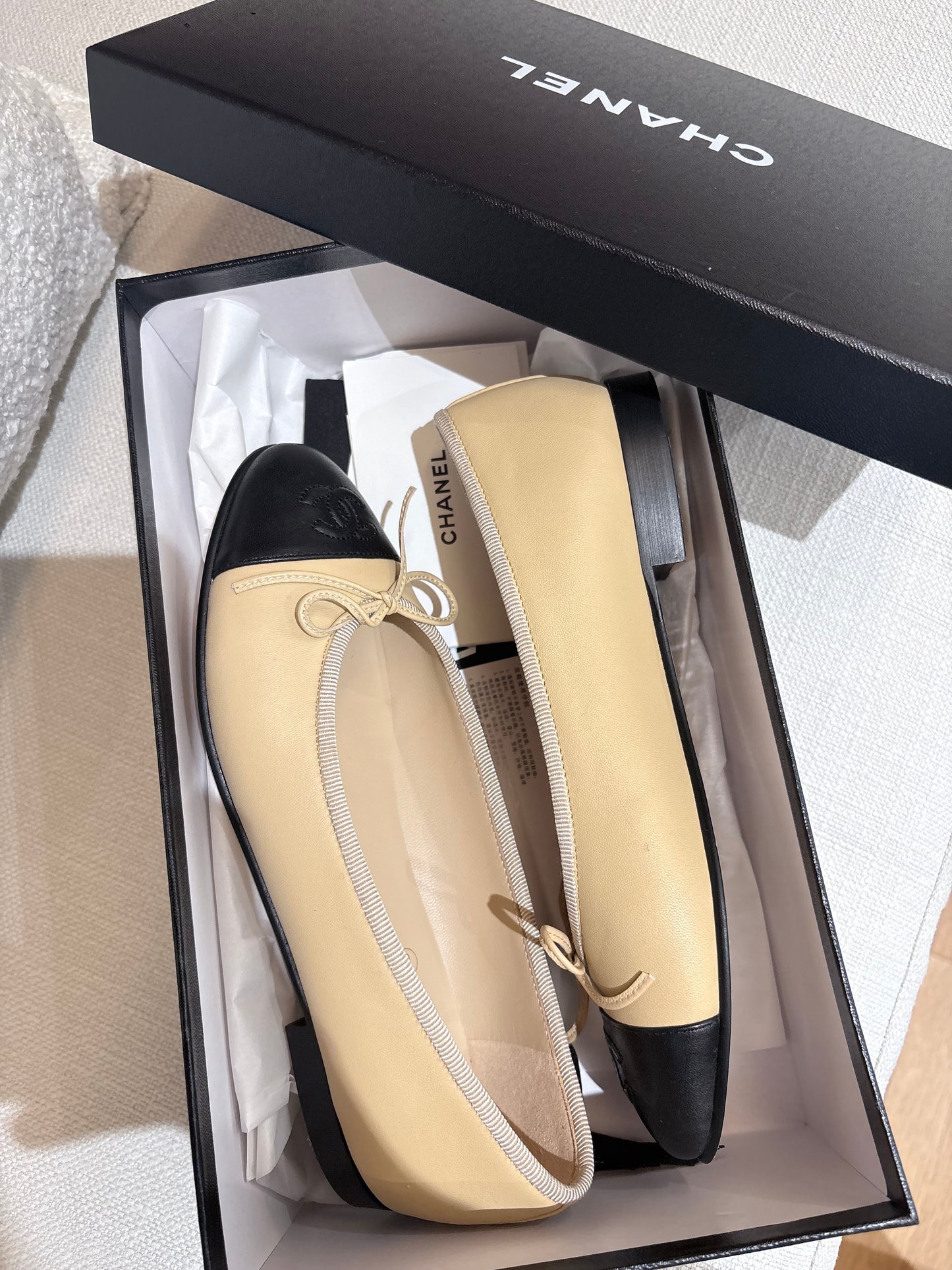Chanel cap-toe ballet flats